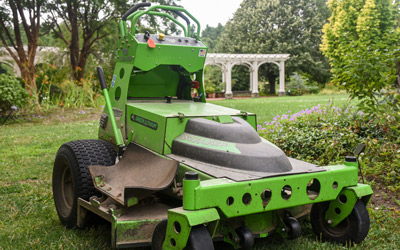 Green lawn mower on the Lawn Garden
