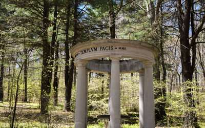 The Temple of Peace rests at the bottom of the Inner Park as visitors walk toward the Wildlife Refuge Pond.