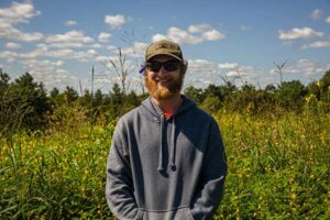 Land Steward Robert Graham pictured in front of the “Mountain View Meadow.”
