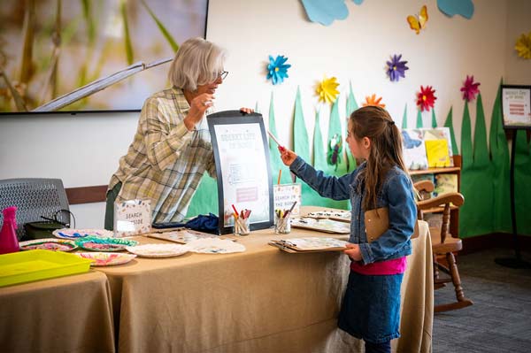 A girl doing an activity during April Vacation week.
