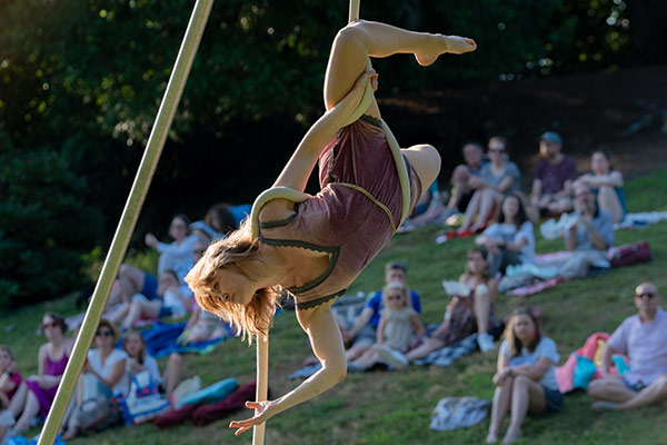 An aerialist performing outdoors
